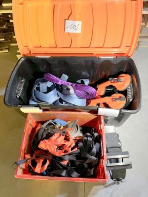 an orange box with a pair of shoes in it