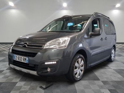 the grey van is parked in the garage on a checkered floor