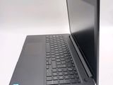 a laptop that is sitting on a white table