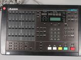 a black control panel with multiple buttons and wires on it