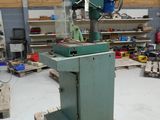 a machine that is sitting on a pallet in a warehouse