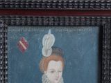 portrait of a woman in a blue dress with a red ribbon