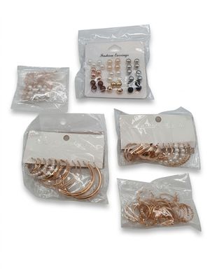 a lot of different types of hair pins in bags