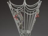 a metal umbrella stand with an umbrella on it
