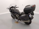 a motorcycle that is parked on the floor in a room