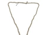 a white pearl necklace with a silver clasp on a white background