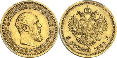a gold coin with the image of a man and a bird on it