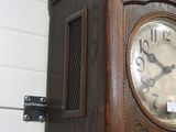 a clock that is on the side of a wall