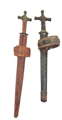 pair of old and rusty swords on a white background with a white background