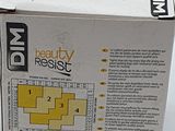a box of beauty resist on a white surface