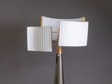 a lamp that is sitting on a table with a lamp on top of it