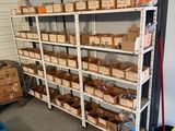 many boxes of food on the shelves in the garage