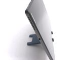 a close up view of a tablet computer on a stand