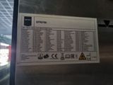 a sign on the side of a metal door that has information on it