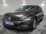 the volkswagen passat is parked in a large room with checkered flooring