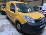 a yellow van that is parked in a garage
