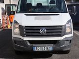 a white van that is parked in a parking lot