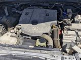 a picture of a car engine with its hood open