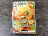 a close up of a pokemon card on a table
