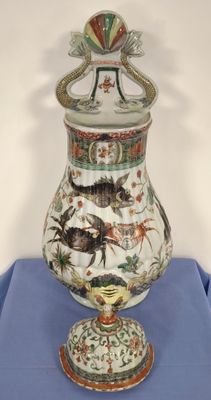 a vase that is sitting on a blue cloth