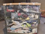 a cart with many items in it in a warehouse