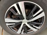 the rim of a car is shown with a tire on it