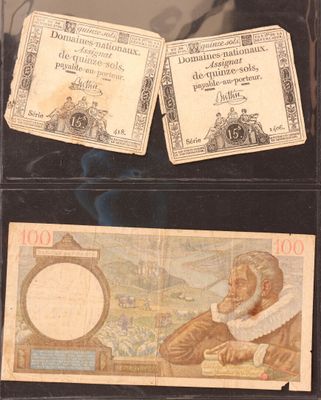 two old german bank notes with a picture of a man and a woman