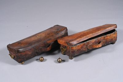two wooden boxes that are sitting next to each other