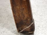 a close up view of a piece of wood on the floor
