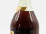 a bottle of liquor that is sitting on a table