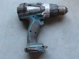 a drill that is sitting on the floor