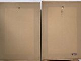 two boxes that are sitting on top of each other