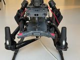 an image of a small robot sitting on the floor