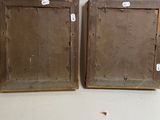 pair of antique wooden picture frames with labels on them