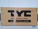 a cardboard box with a sign on it that says tyc