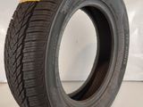 a close up of a tire on a white surface