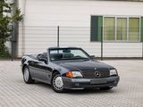 a black convertible car parked in front of a building