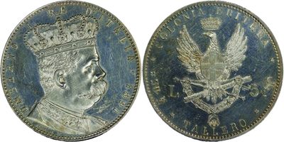 a close up of a coin with a crown on top of it