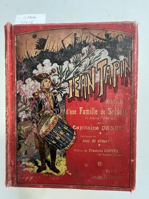 un livre rouge sur lequel figure l'image d'un homme tenant un tambour