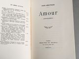 an open book with a picture of a bird on it