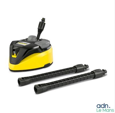 un aspirateur jaune et noir à côté de deux tuyaux noirs