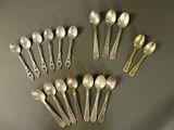 a lot of spoons and spoon spoons on a table