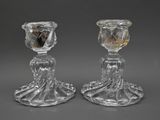 paire de bougeoirs en cristal taillé représentant une femme et un homme