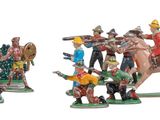 plusieurs figurines de différents types, disposées sur une surface blanche
