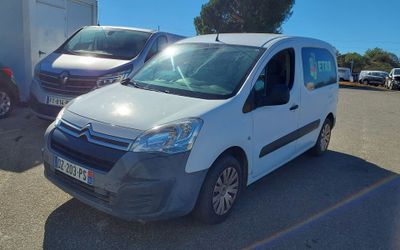 a white van that is parked in a parking lot