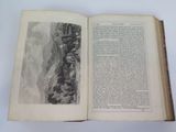 an open book with a black and white image of a man climbing a mountain