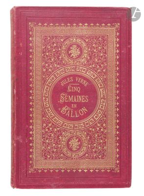a red book with gold lettering on it and a gold border