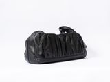 black leather handbag on a white background with a white background
