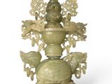 a statue of a person on a turtle on a pedestal