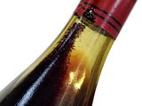 a bottle of wine that is sitting on a table